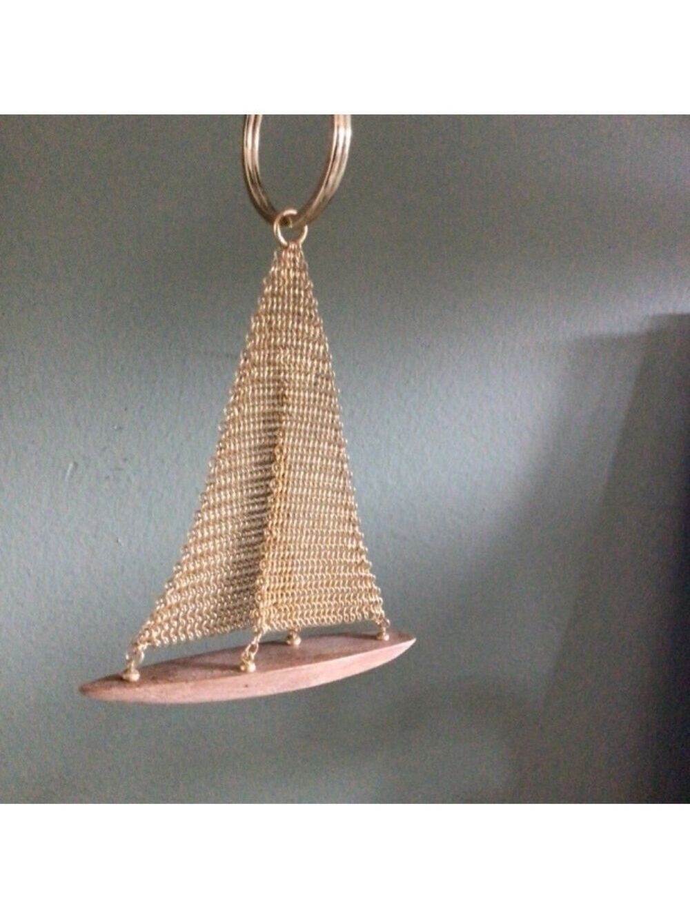 Metal and teak sailboat keychain